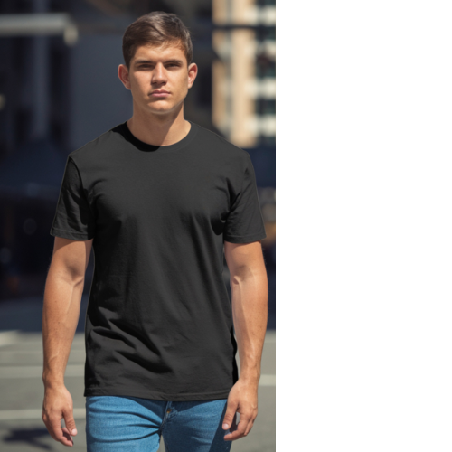 Man wearing a black t-shirt and blue jeans standing outdoors.