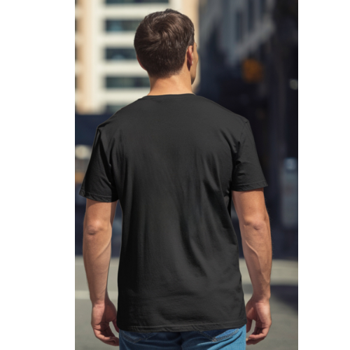 Man wearing a black t-shirt with a blurred background