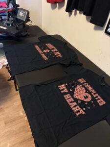 Home Custom graphic shirts beside the Vividly Print heat press